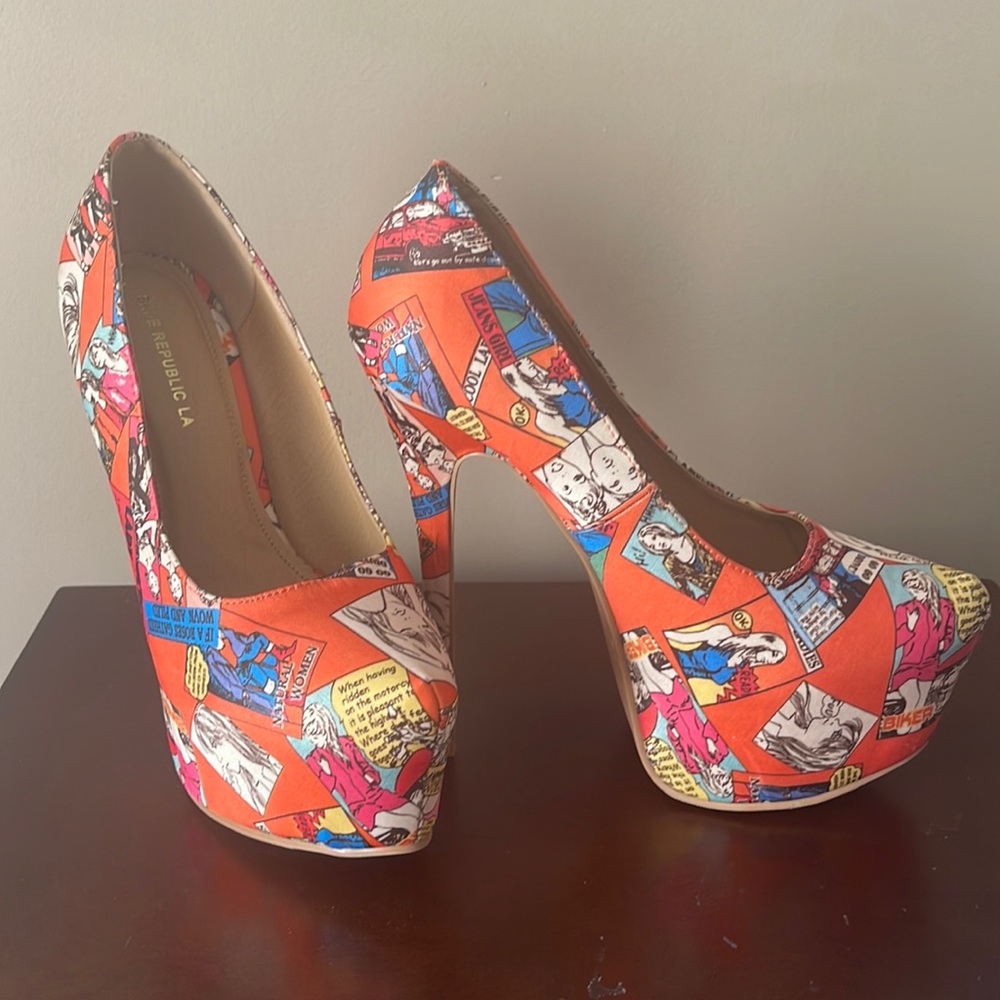 Orange comic book heels, never worn.  5 1/2 in heel.